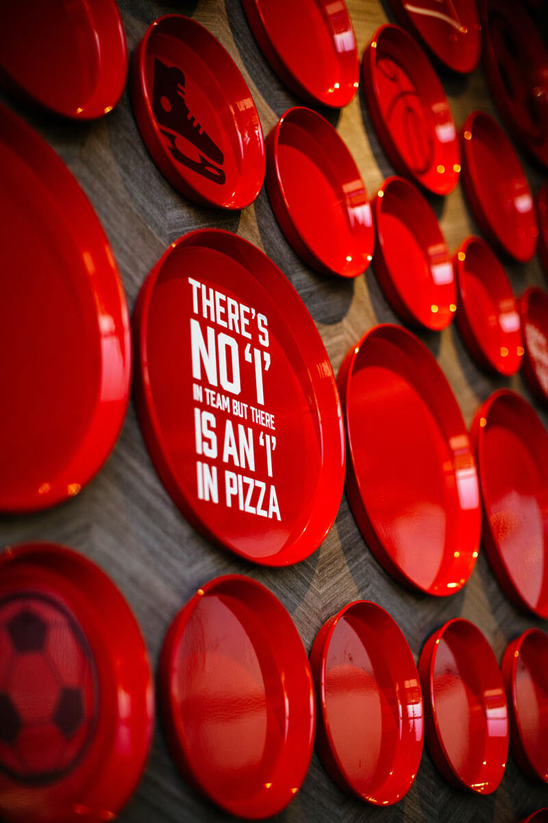 Boston Pizza plate wall