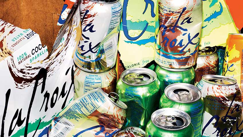 LaCroix sparkling water cans with their packaging