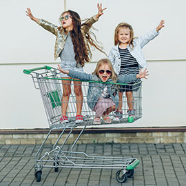 Three Gen Z Girls in shopping cart