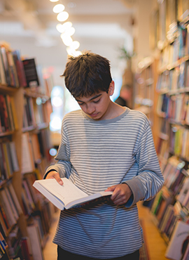 Boy reading a book