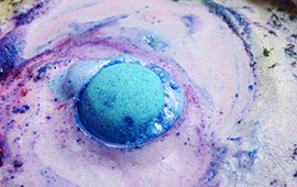 Close up of bath bomb dissolving