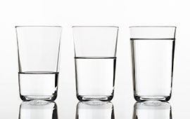 Photo of glasses that are half full and half empty