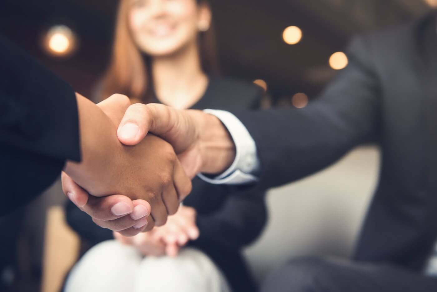 handshake between two business people