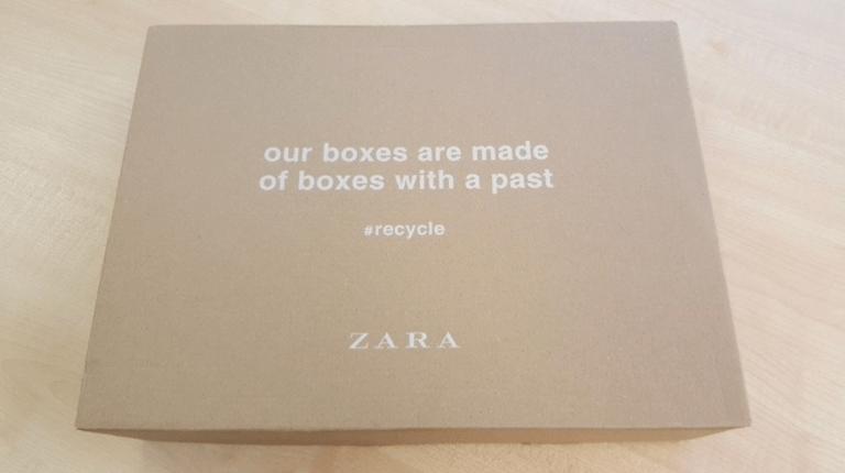 Zara recycled box with the words "our boxes are made of boxes with a past" on it.