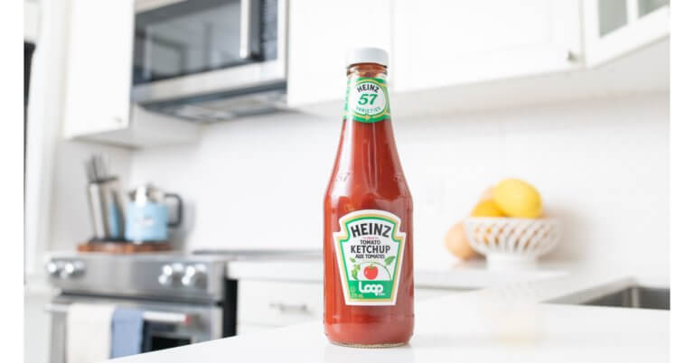 Kraft Ketchup bottle in kitchen with LOOP logo on the bottom