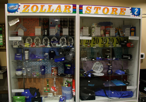 The zollar store machine showcasing prizes employees can win