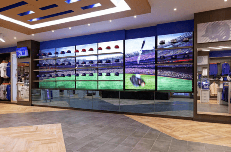 jays shop hat wall with digital signage